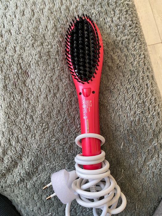 Електрическа четка за изправяне на коса