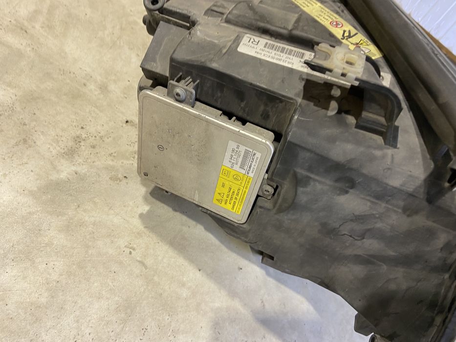 Far faruri stanga dreapta xenon Bmw E90 E91 Nfl de ANGLIA