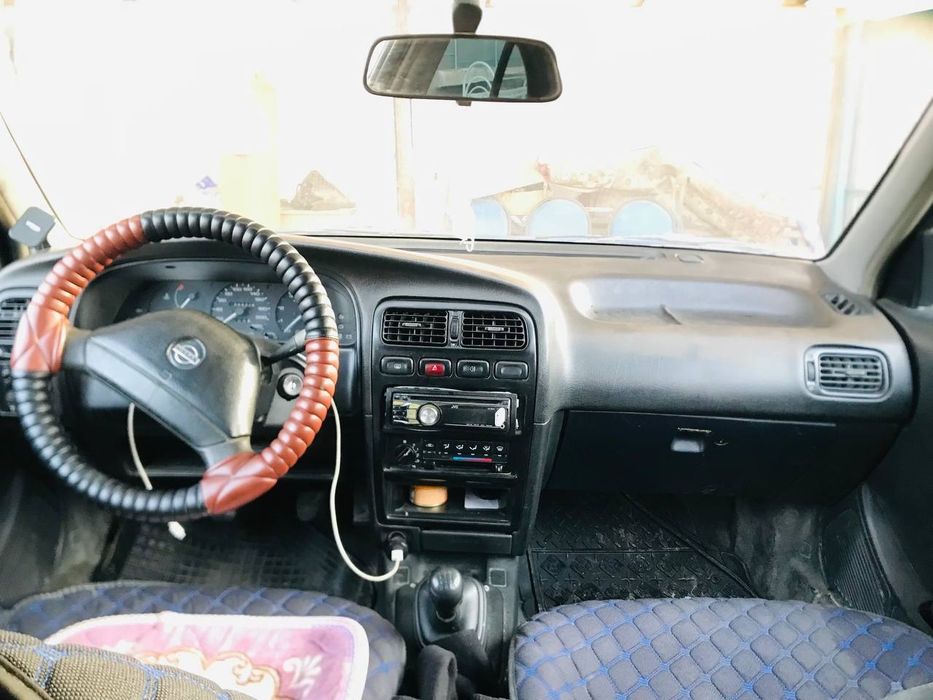 Ниссан примера .