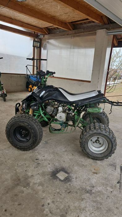 Vând atv 125 cc kxd