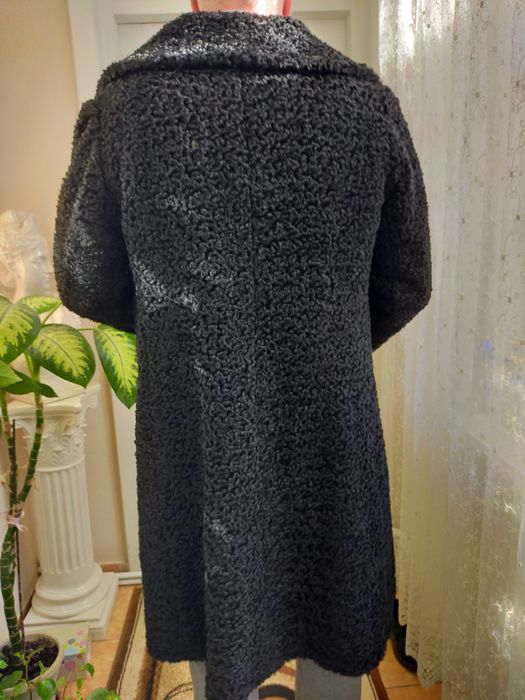 Haina de blana artificiala.Astrahan