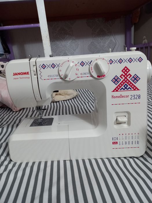 Швейная машина  JANOME 2320