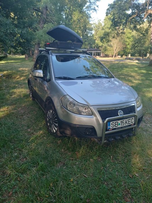 Vând sau schimb fiat sedici cu Renault kangoo