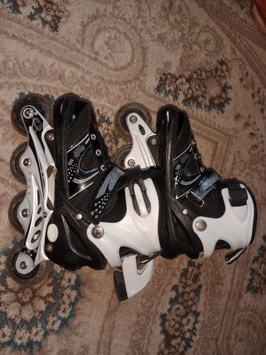 Роликовые коньки