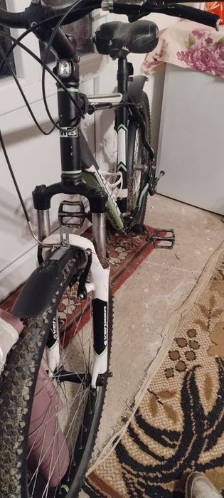 Bicicletă nouă,dau la schimb pe un telefon