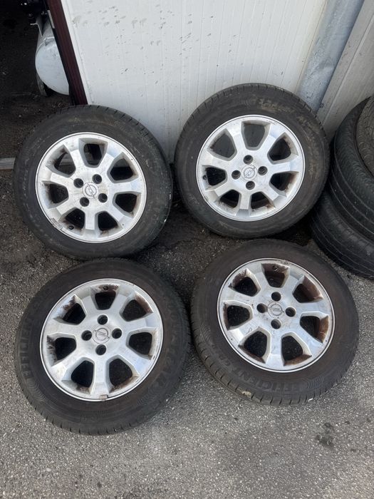 Roți originale Opel Astra G - 4x100 - 195/60 R15