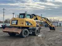Excavator CAT M313D 2012 (cupa taluz inclus)