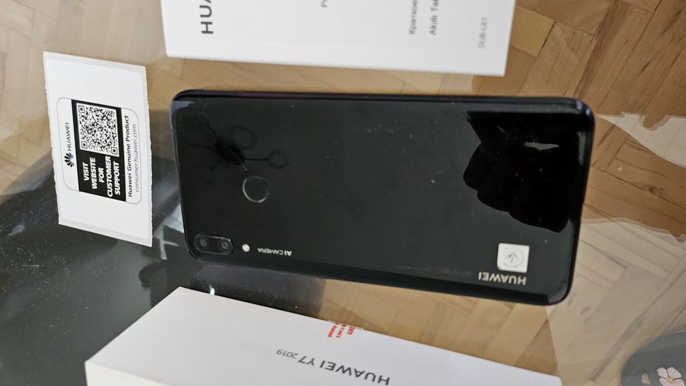 Телефони за части