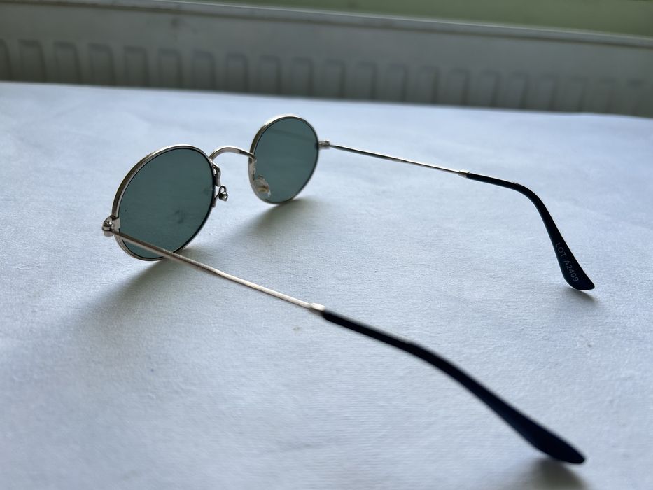 Ochelari de soare rotunzi, lipsa o pernita/sa nazala