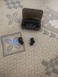 True wireless earbuds with power bank
