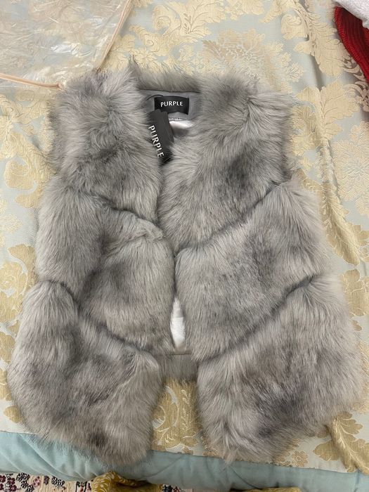 Меховая жилетка новая