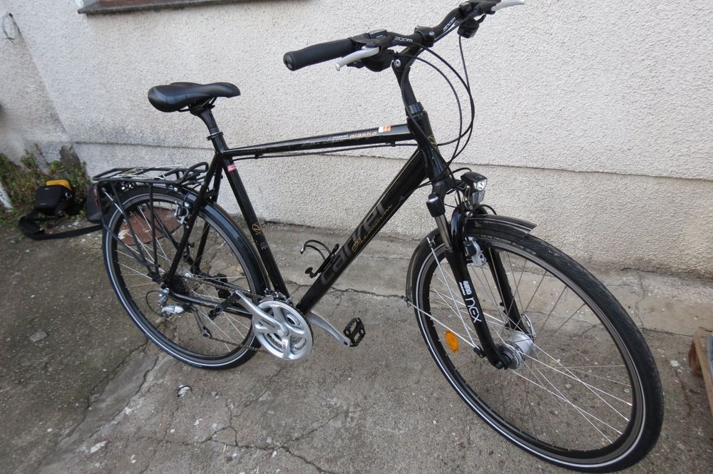 Vând bicicleta trekking Carver