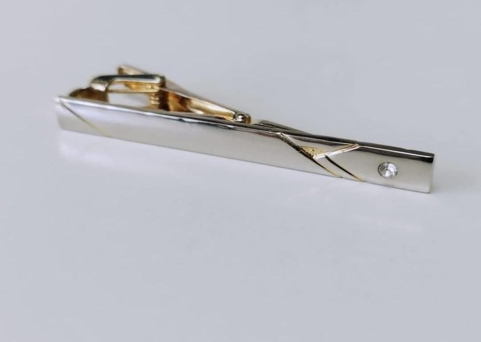 Vechi ac de cravata placat cu argint