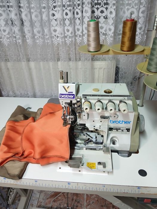 Masina de cusut cu 2 ace 4 fire overlock BROTHER 
Model EF4 -V41 
Masi