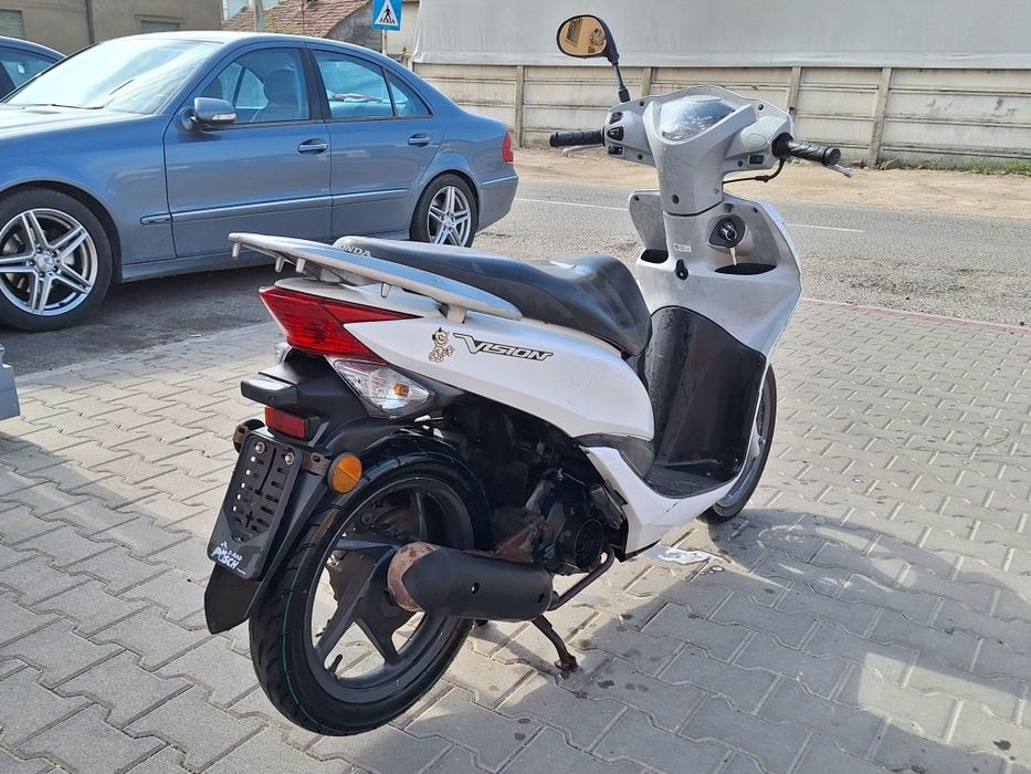 Honda Vision 49cm 4 timpi An 2012