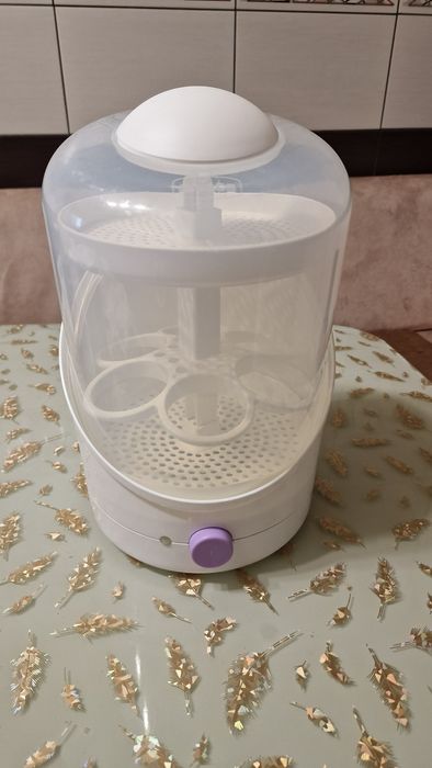 Vand Sterilizator biberoane/suzete,marca Chicco