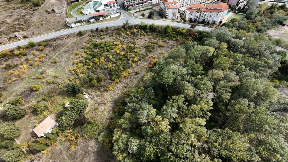 Парцел ,земя до к.к.Слънчев бряг близо до пътя