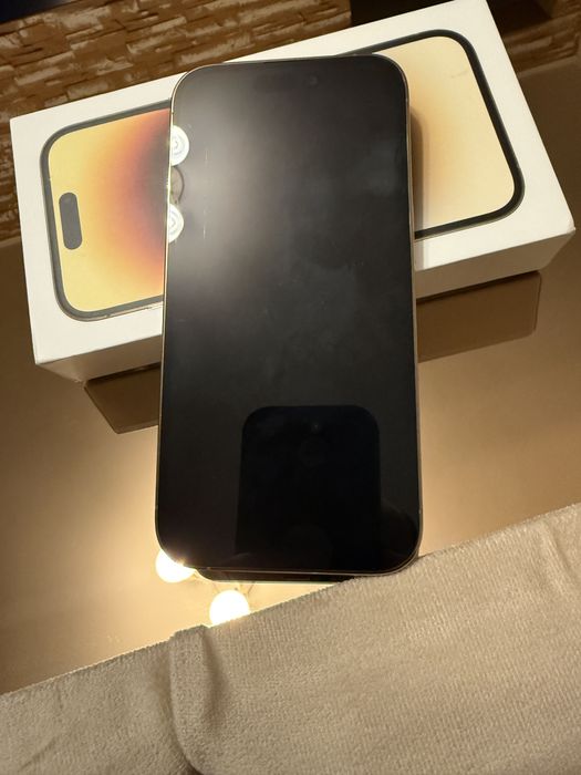 - IPHONE -14-PRO GOD/128 gb,full box,battery health 85%