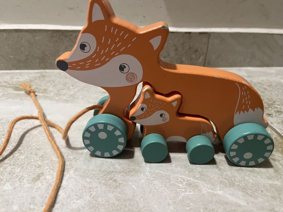 Дървени играчки - на колела, за водене
