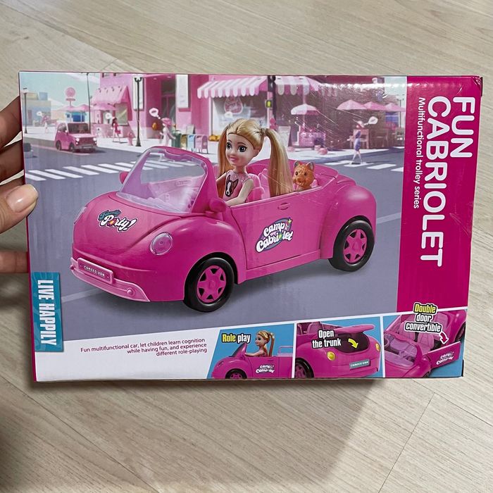 Кукла в машине игрушка