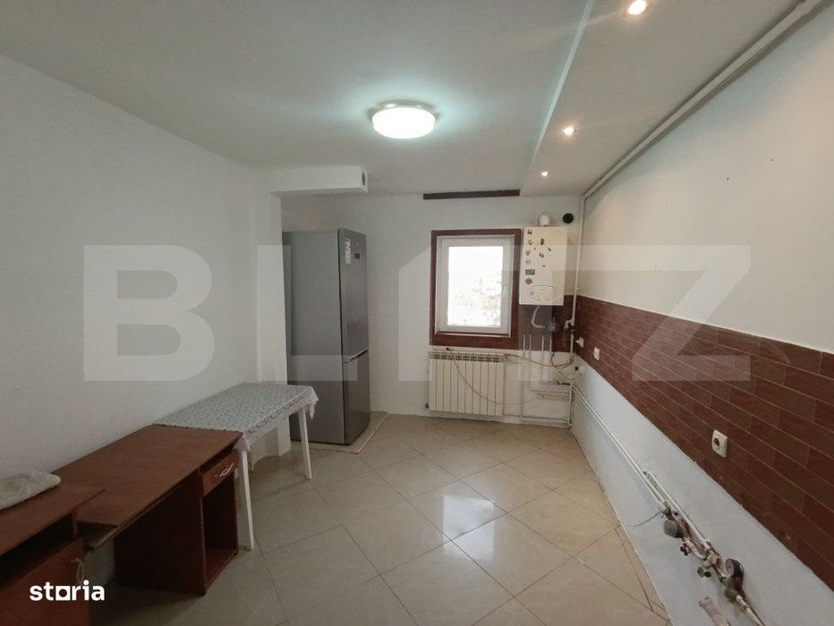 Apartament spatios  - 4 camere, 2 bai, 2 balcoane, loc de parcare