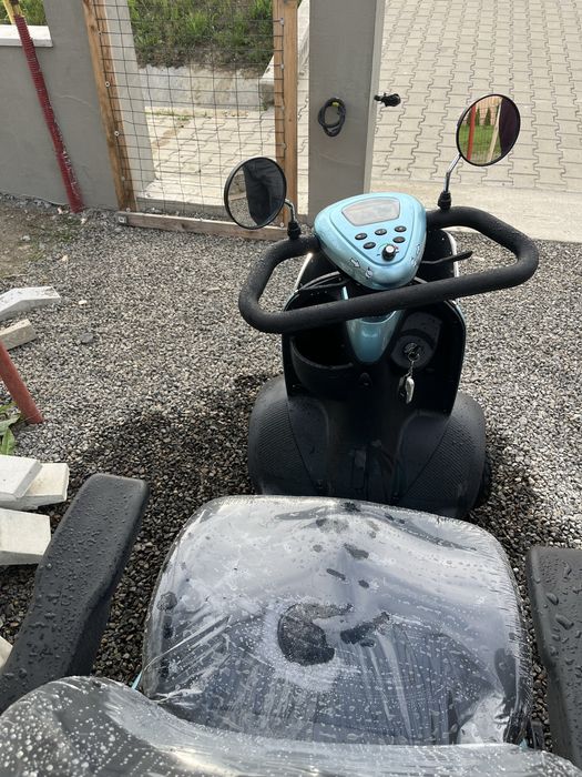 Scuter electric pentru persoane cu dificultati de deplasare
