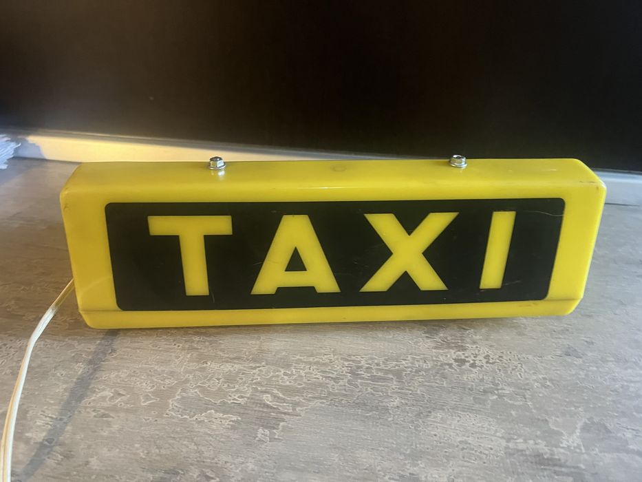 Firma Taxi decorativa