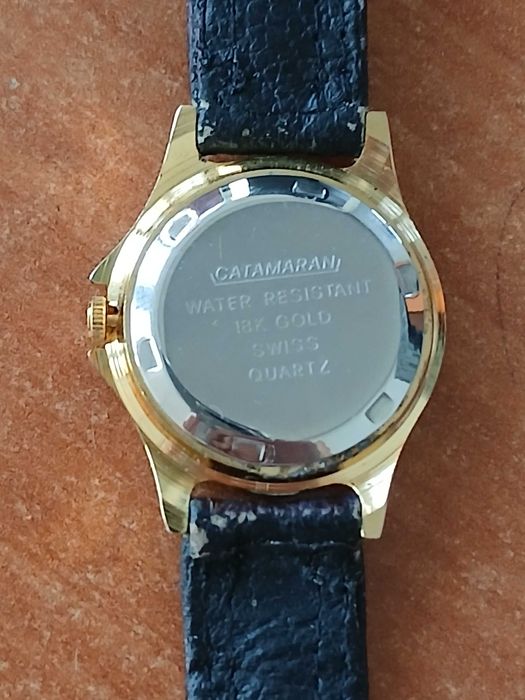 ceas Catmaran aur 18 k water resist swiss quartz