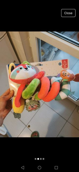 Jucărie de agățat pe carut