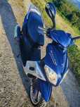 Vând scooter Peugeot 125 cm an 2009 in stare excelenta