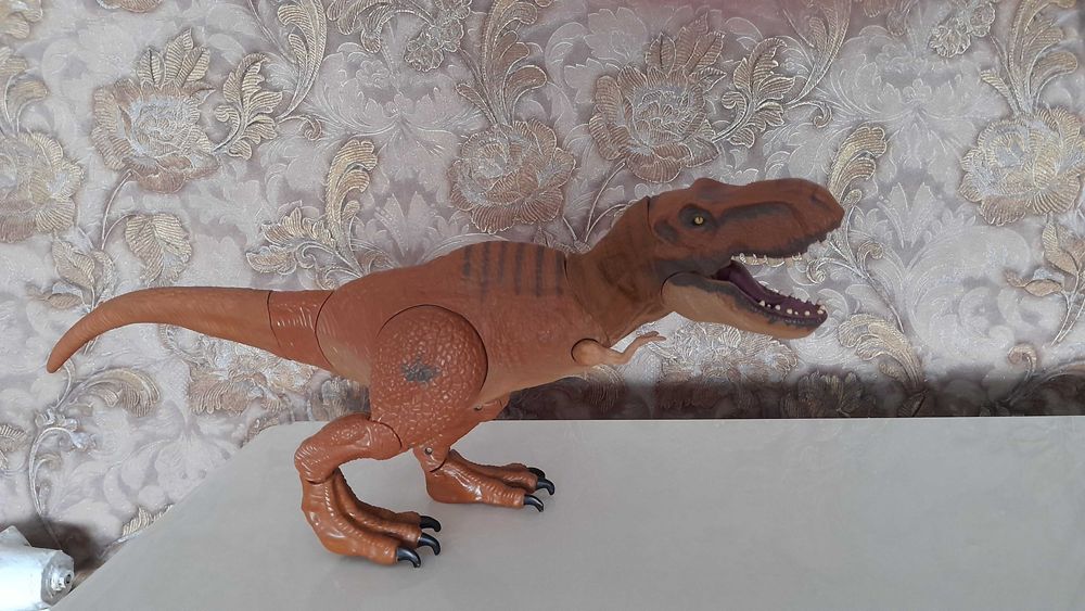 Тиранозавр игрушка