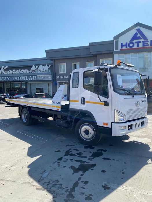 В продаже Новый Эвакуатор FAW борт длина 6 метр универсал вариант