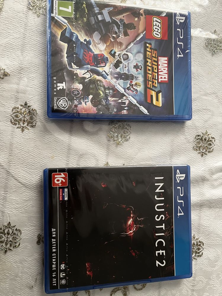 продам новые диски на PS4,PS5.  Super heroes 2,Injustice 2