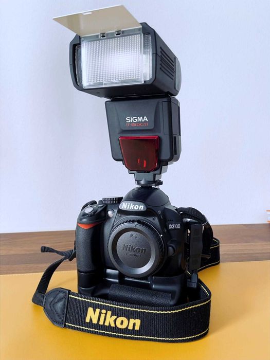 Nikon D3100 + 2 obiective (18-55 VR, 35/1.8G) + blitz, 11.800 cadre