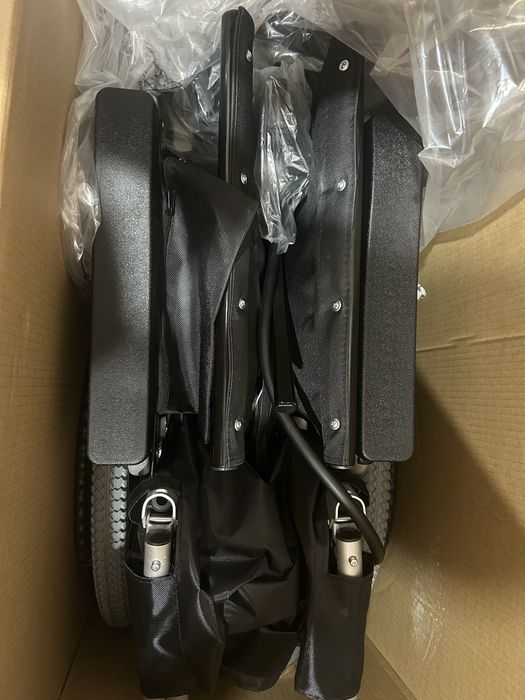 Электрическая инвалидная коляска