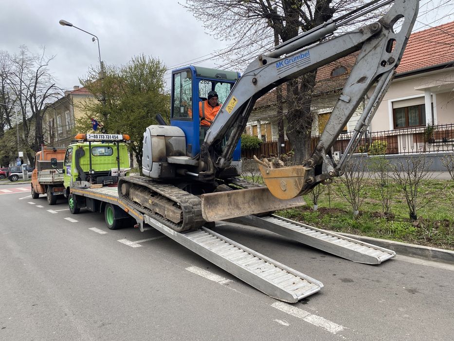 Ofer setvici cu stivuitor si rampe de desc si incarcat utileje
