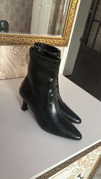 Ботинки с каблуком