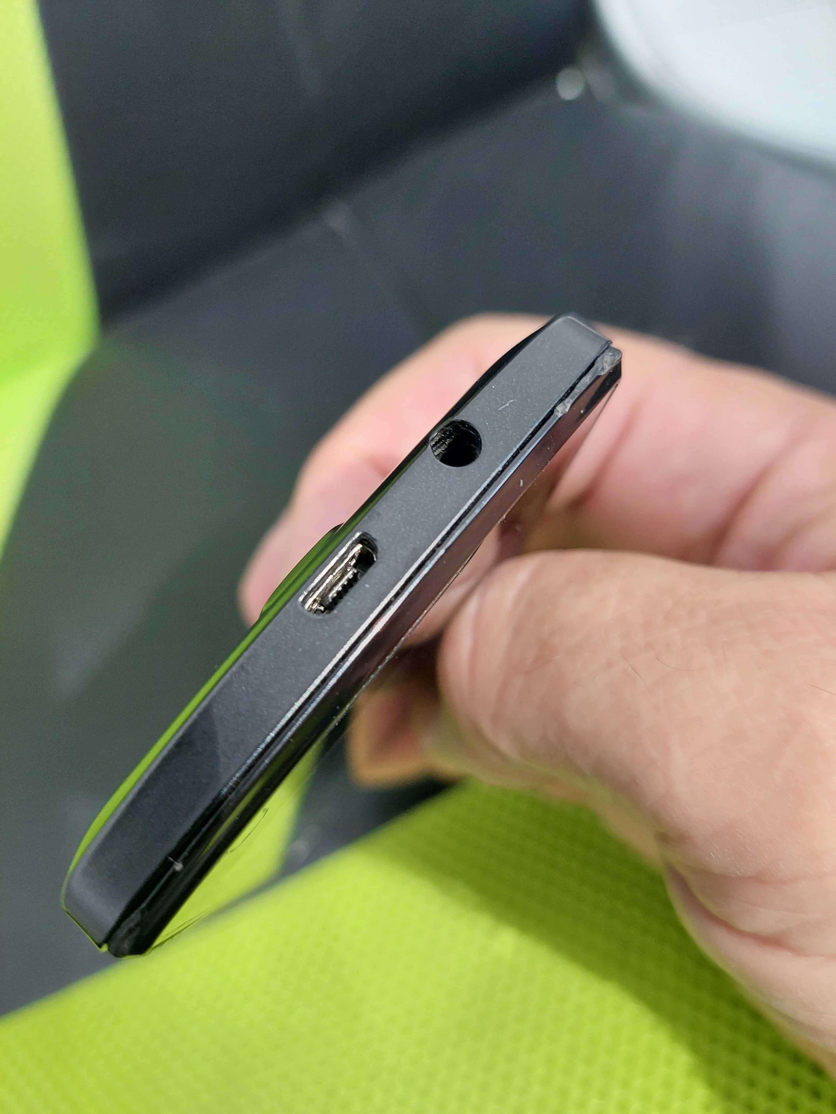 Lenovo A 1000 - телефон