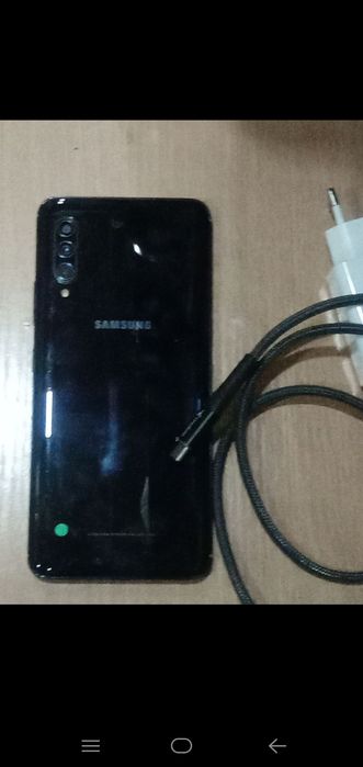 Продается.  Корейский мобильный телефон .Самсунг гелокси 5 д