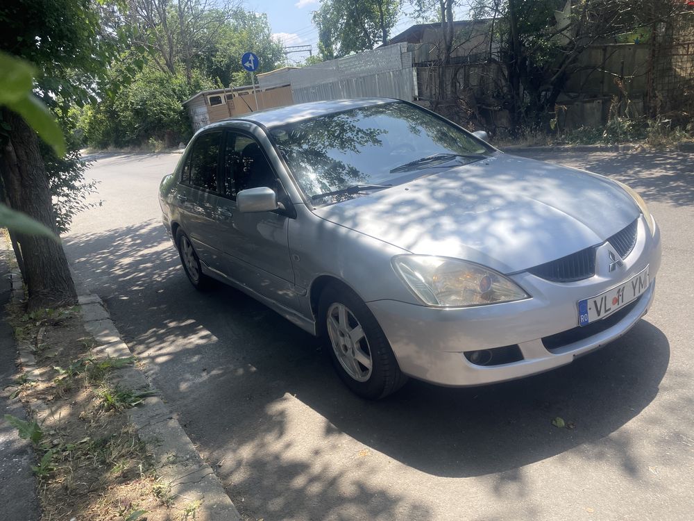 Vand sau schimb Mitubisi Lancer 1.6 benzina cu gpl