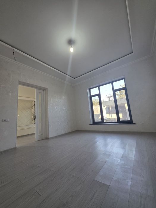 Кибрай Бурота махалла янги уй 3 хона 2,3 сотих .