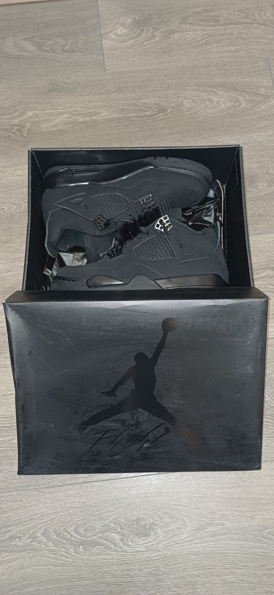 Jordan 4 black cat
