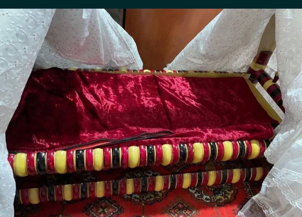 Beshik va ko'rpacha bilan