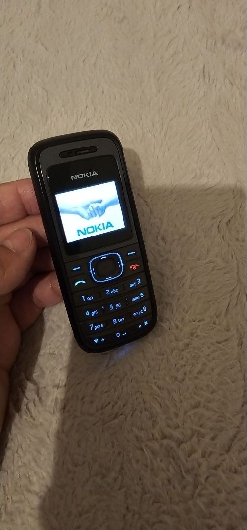 Nokia 1208 stare buna ,meniu în lb Română