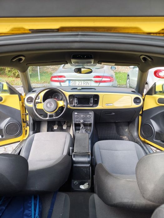 VW BEETLE 1.2 BENZINA 105 CP ,ITP NOU
2 geamuri electrice
dublu climat