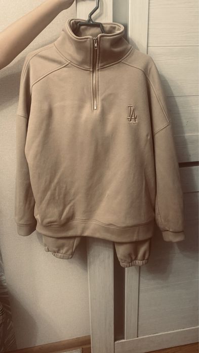 Продам спортивый костюм