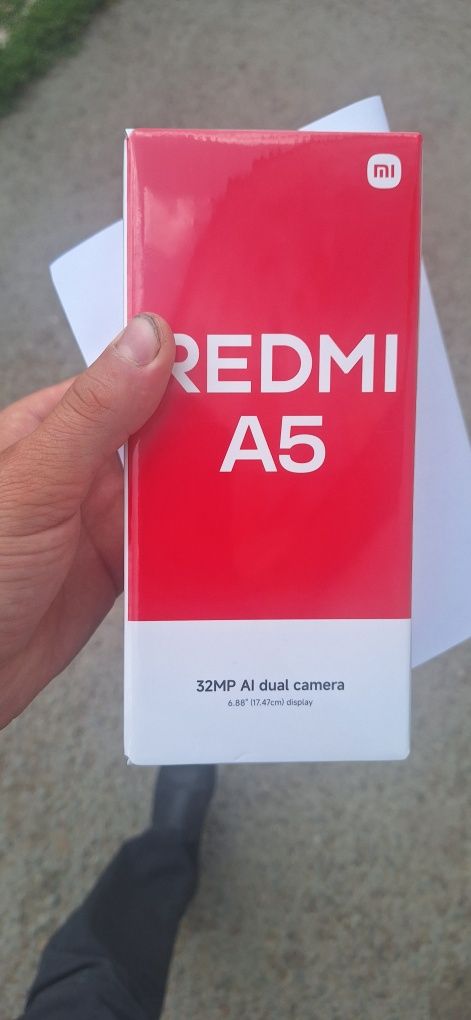 Продам редми а5 .