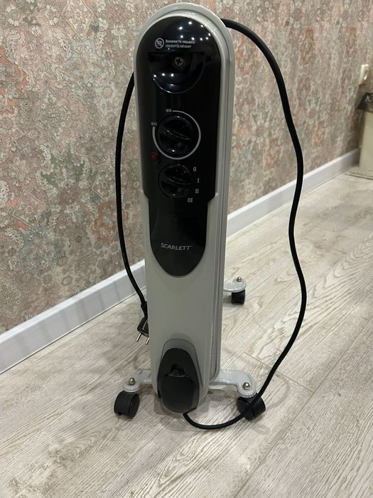 Масляный электрообогреватель