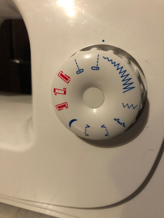 Mașina de cusut Singer