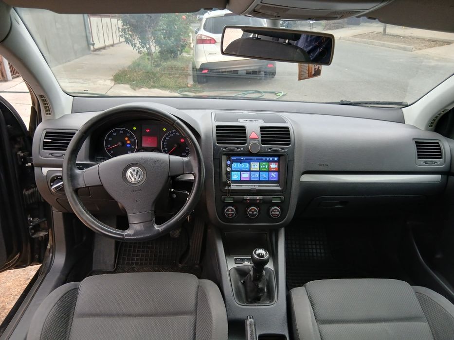 VOLKSWAGEN golf 5 benzina 1.6din 2005,propietar